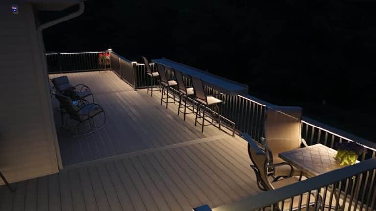 nighttime photo of the lighting on the Millersburg PA custom deck installation by Upper Dauphin Vinyl Products