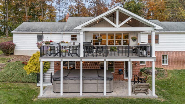 Brand new deck with a hot tub underneath and a pavilion above