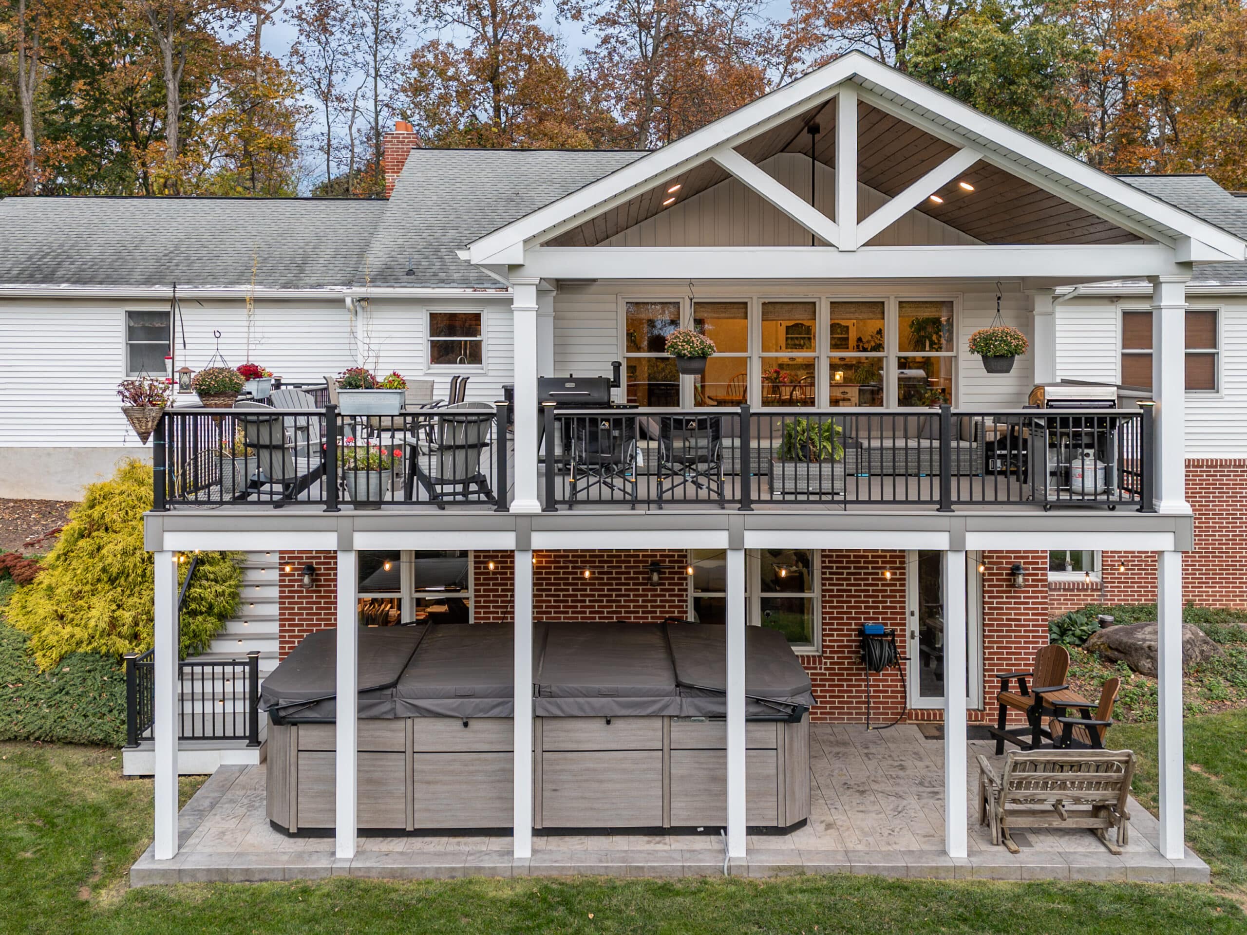 Brand new deck with a hot tub underneath and a pavilion above