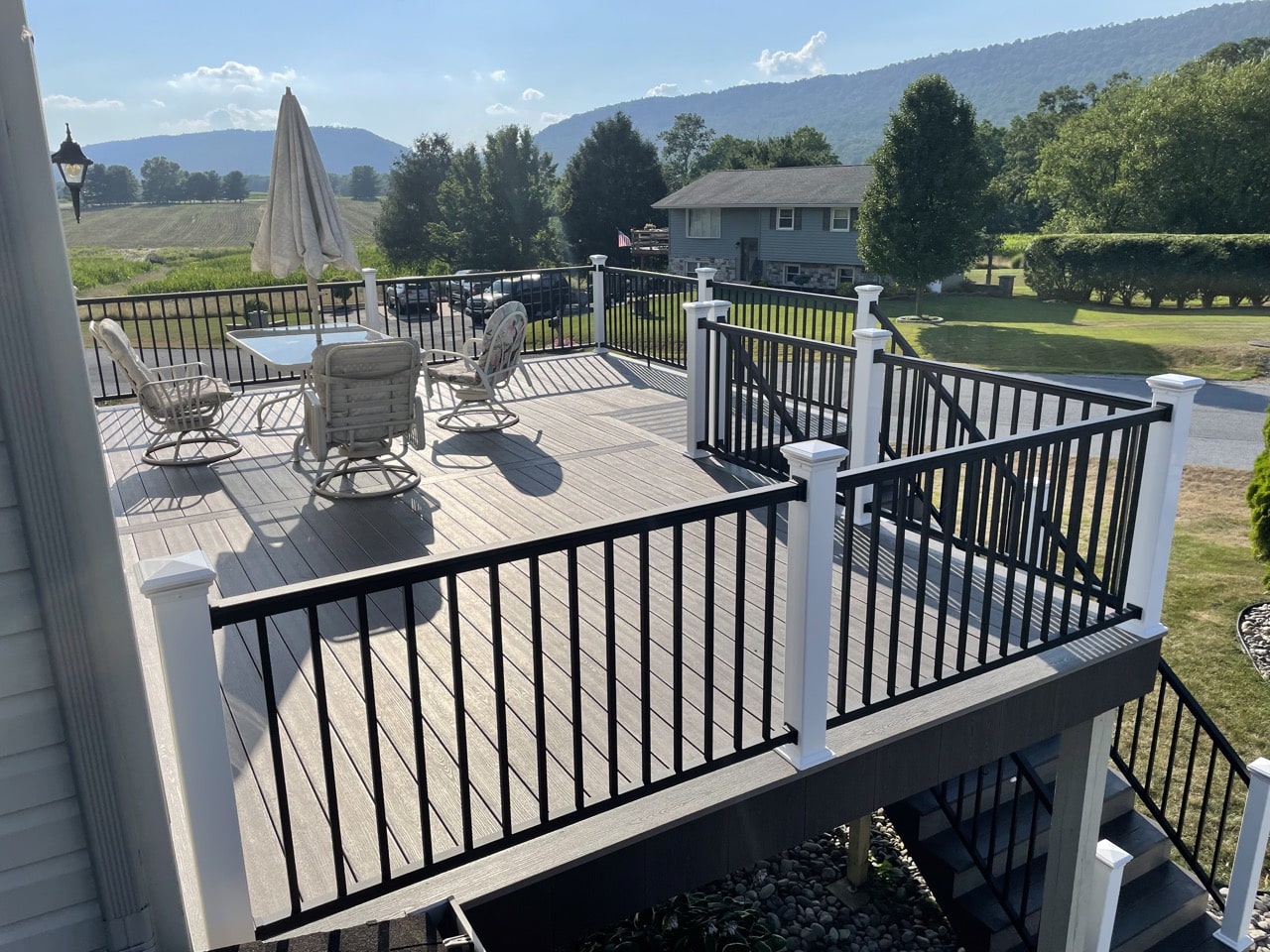 a deck with stairs leading up to it in colonial park PA