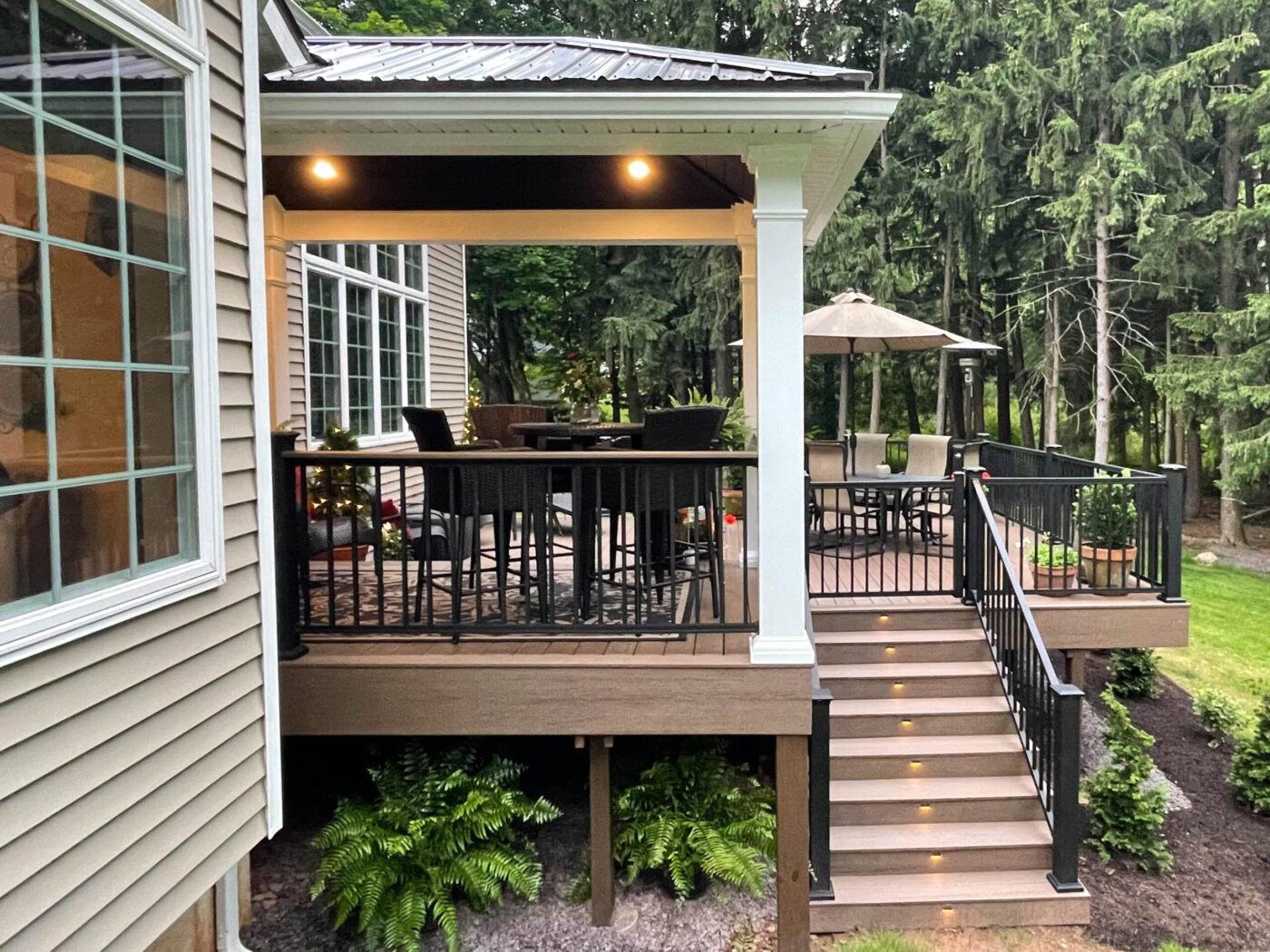 a deck with a staircase that has built-in lights in columbia pa