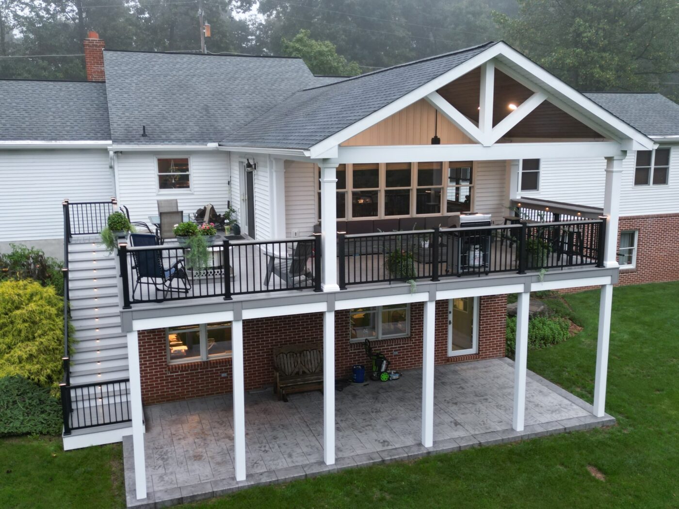 a brand new elevated deck with a staircase leading up to it in mohnton pa