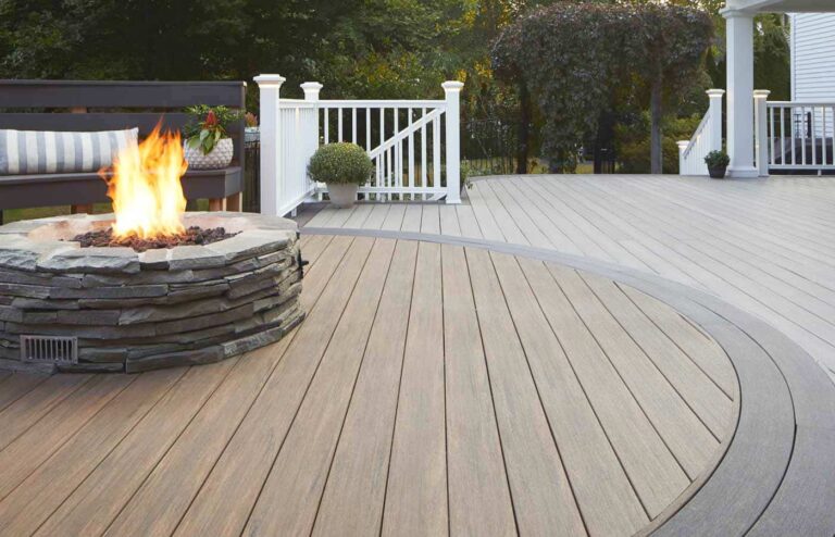 a deck with a round design and a fireplace on it in york pa