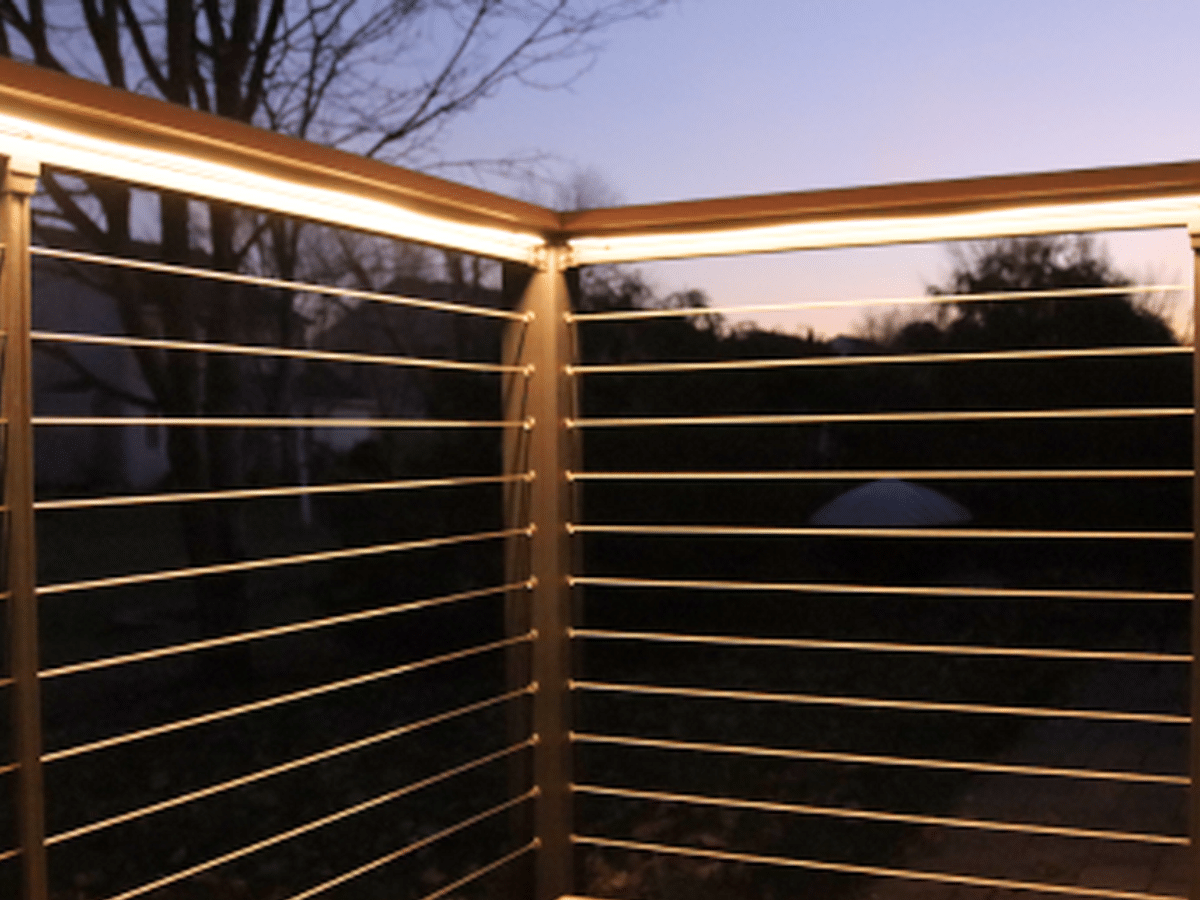 Recessed deck lighting under railing