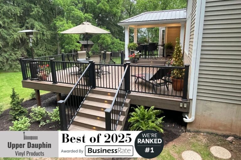 Upper Dauphin Vinyl Products named Best Deck Builder in Elizabethville. View of completed deck project with banner announcing #1 placement by Business Rate