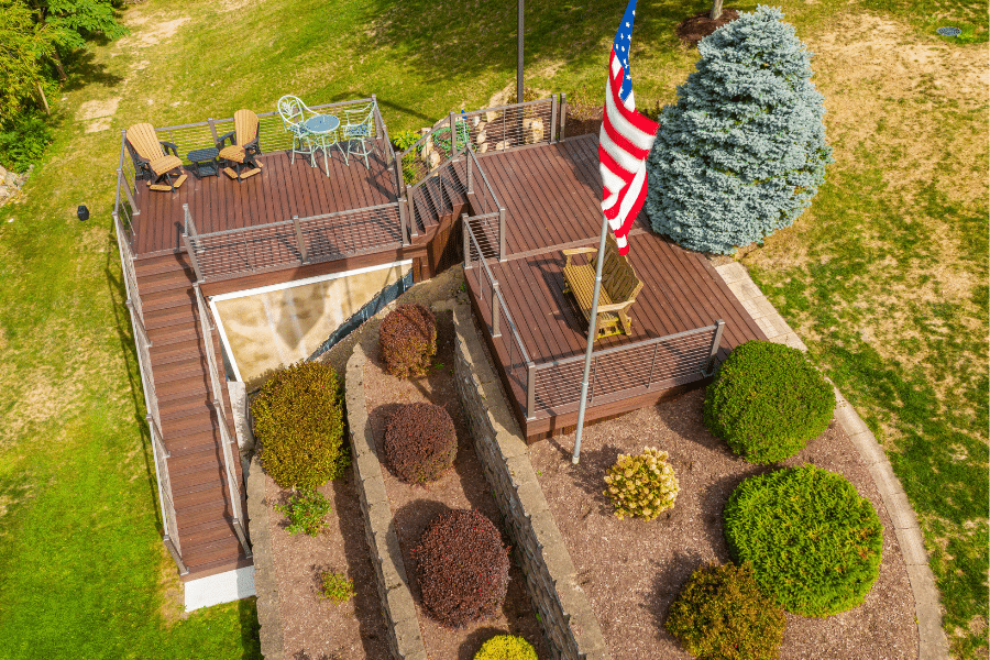 aerial view of brown composite deck with two levels on sunny day
