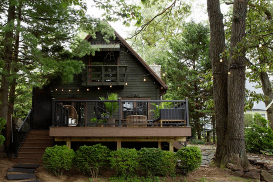 backyard wood composite deck blending in with forest scenery