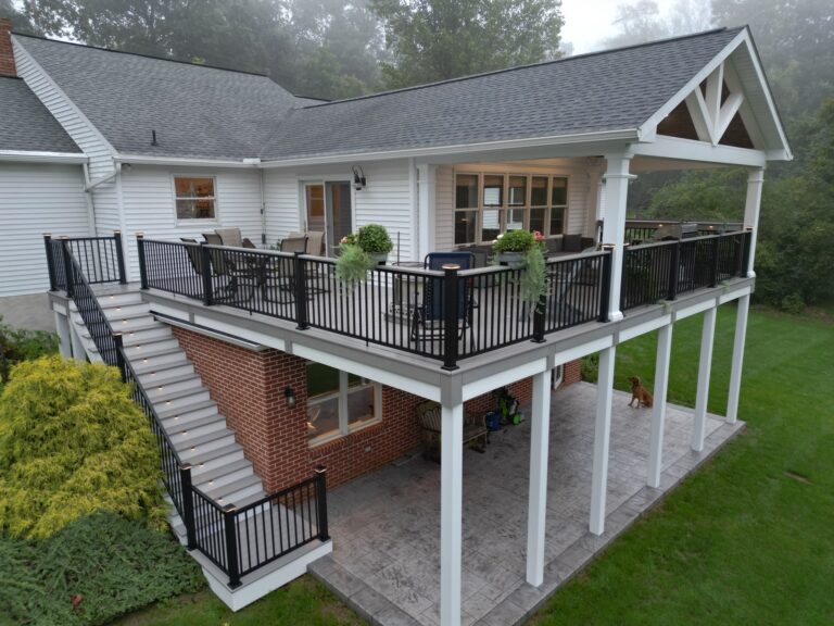 deck with a stamped concrete patio in mifflinburg pa