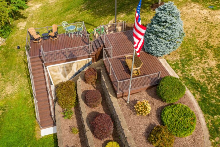 A multi-level brown wood composite deck, deck builders Lebanon PA