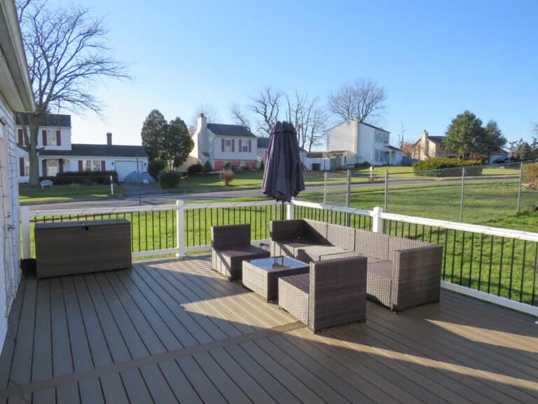 trex deck with chairs and a table