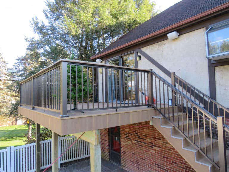 sinking deck replacement and stairs with ada compliant railing
