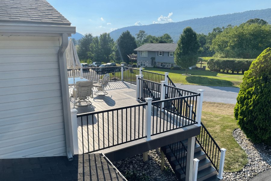 side view of backyard composite deck installed by backyard composite decking contractors in PA